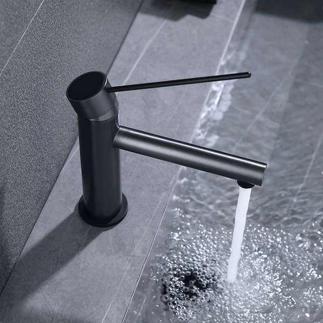 Mezclador de grifo de lavabo de baño negro con función de agua fría y caliente montada en cubierta de cartucho de cerámica